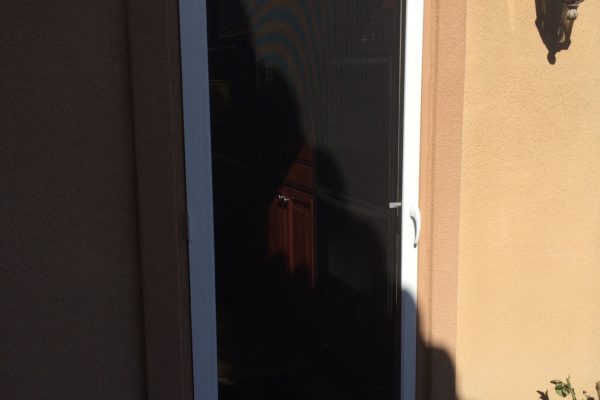 White "vista" swinging screen door installed in Corona 3/10/15
