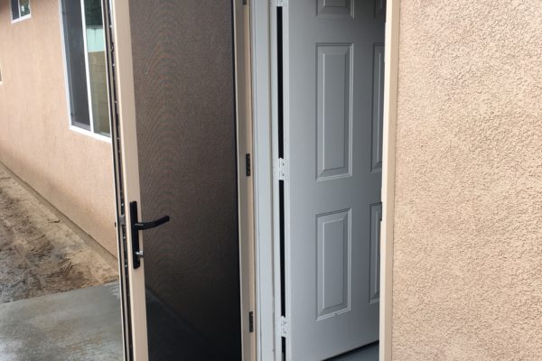 3'0"x6'8" almond Guarda security screen door installed on garage door — Riverside, CA - 2